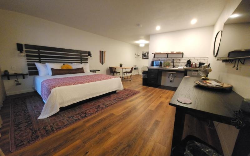 king bed and accessible kitchenette