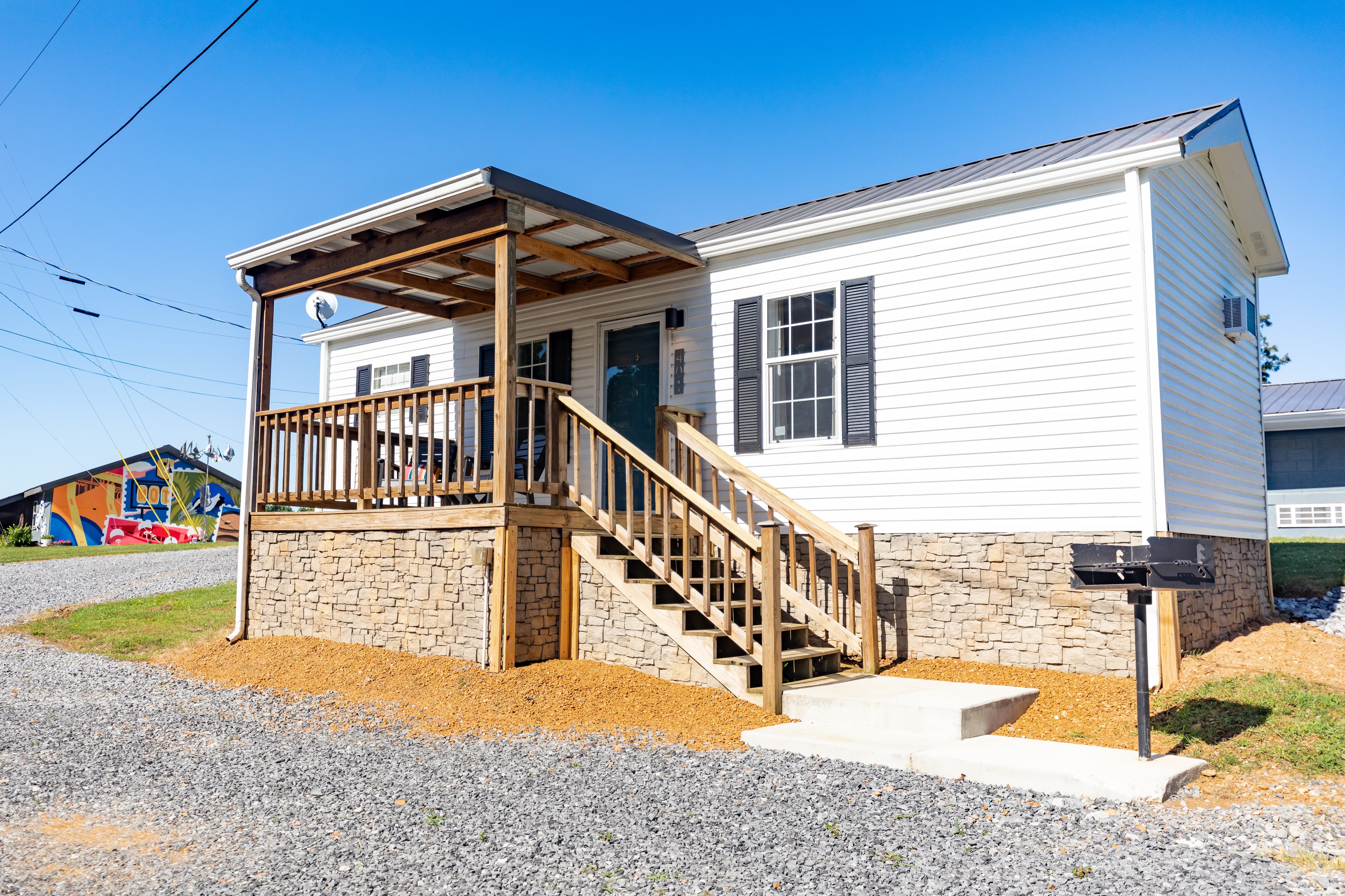 cabin with steps leading to porch