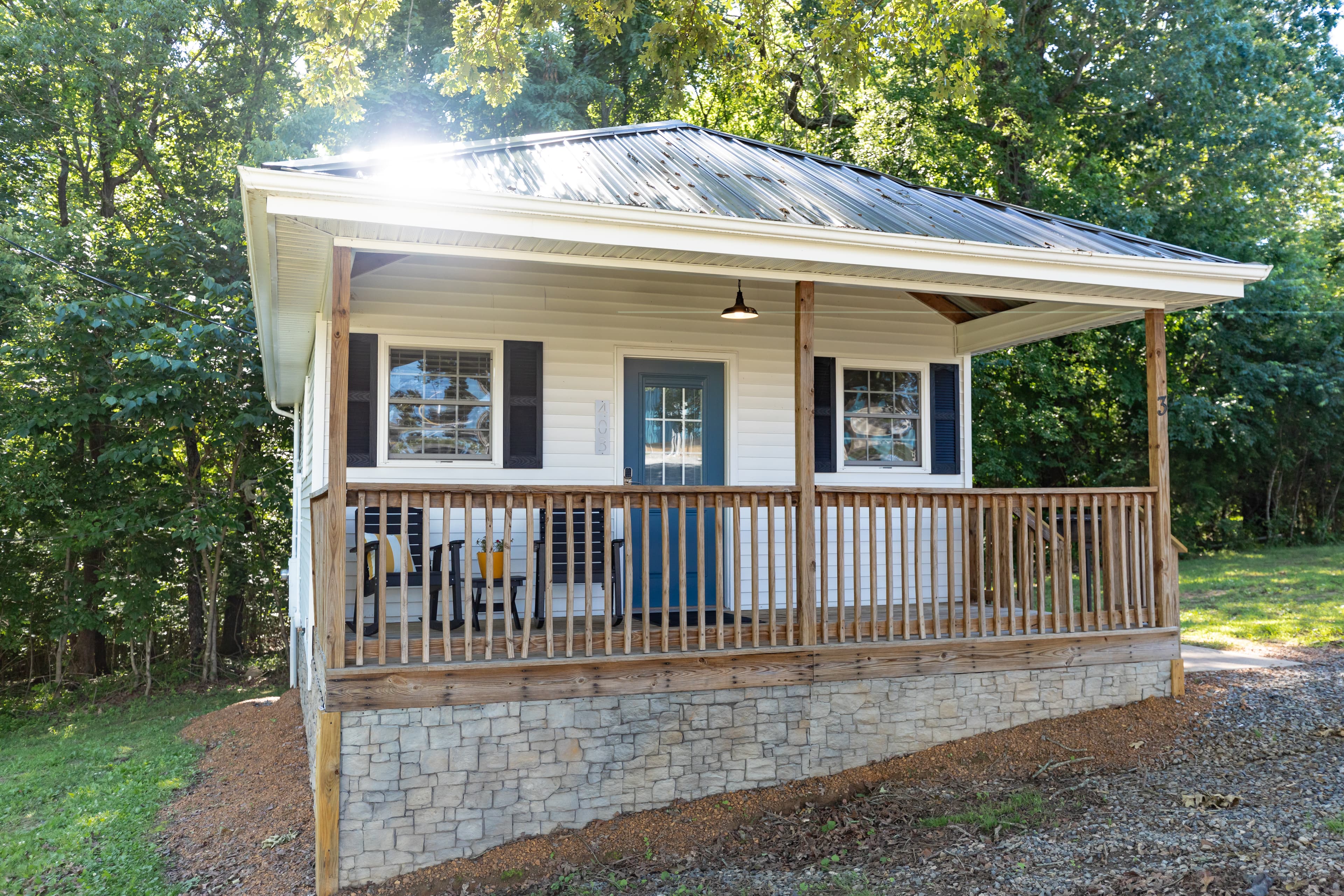 cabin with porch and side entry