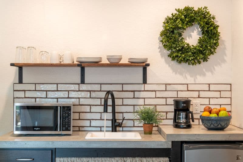 accessible kitchenette with fridge, microwave, coffemaker and toaster