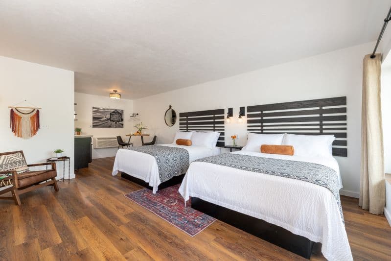 hotel room with two queen beds