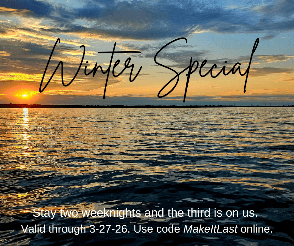 A sunset over water with text promoting a winter special on accommodations.