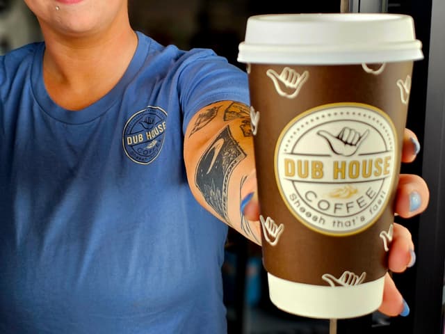 woman serving coffee